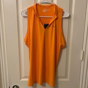 Nike Women's Dri-FIT Golf Polo in an orange colorway.  XL